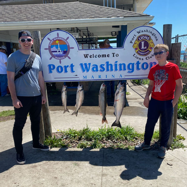Big brothers and big sisters of Ozaukee photo of a big and little fishing