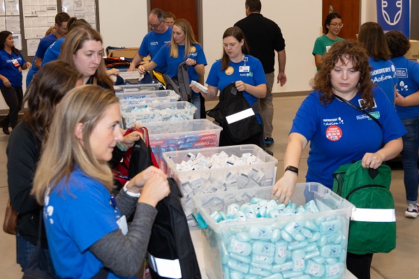 Volunteers kit-packing