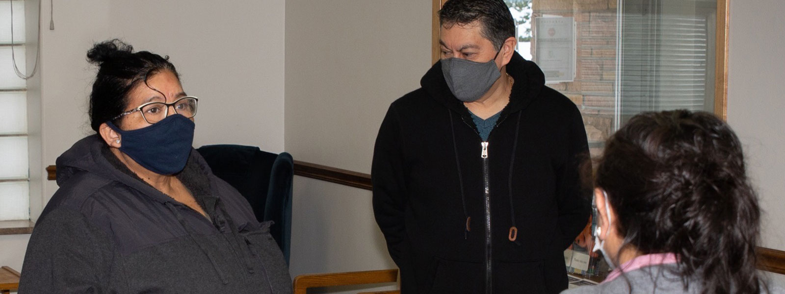 3 People Wearing Masks