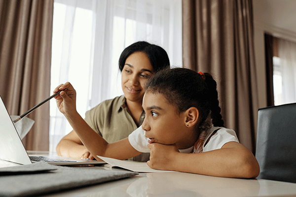 Mother and child at computer.