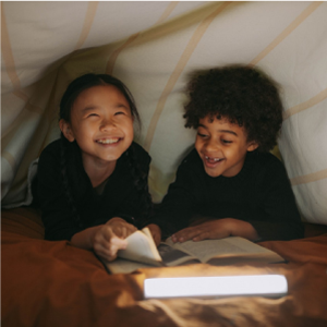 Kids reading and laughing