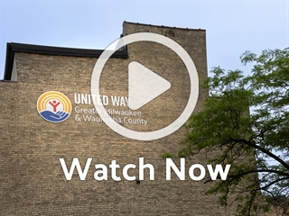 United Way Logo on Building with Overlay Play Button