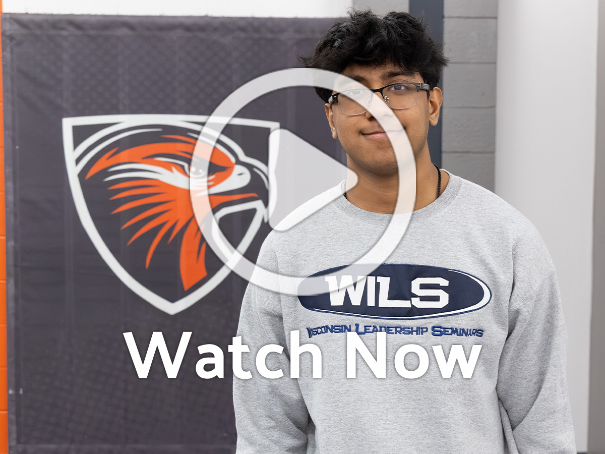 Student in school with overlay play button