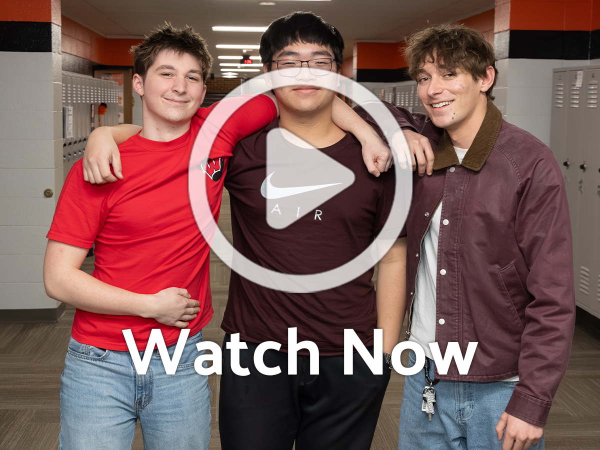 Group of teens with overlay play button