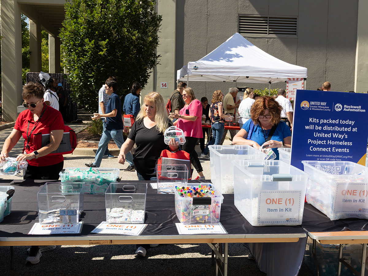 group of volunteers packing at Rockwell Event