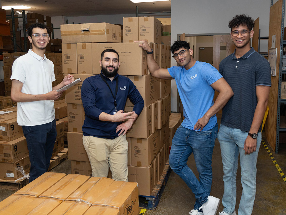 Image of volunteers by boxes