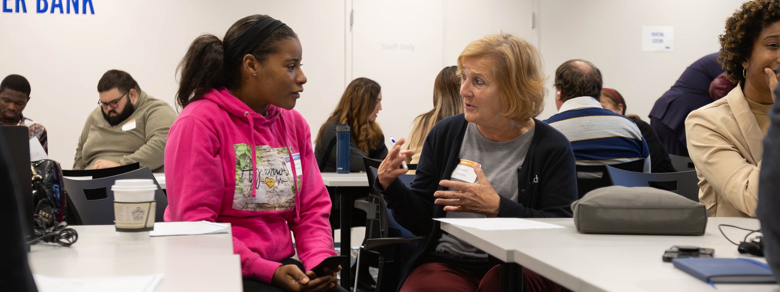 Annette helps a job seeker at our 2023 Job Seminar