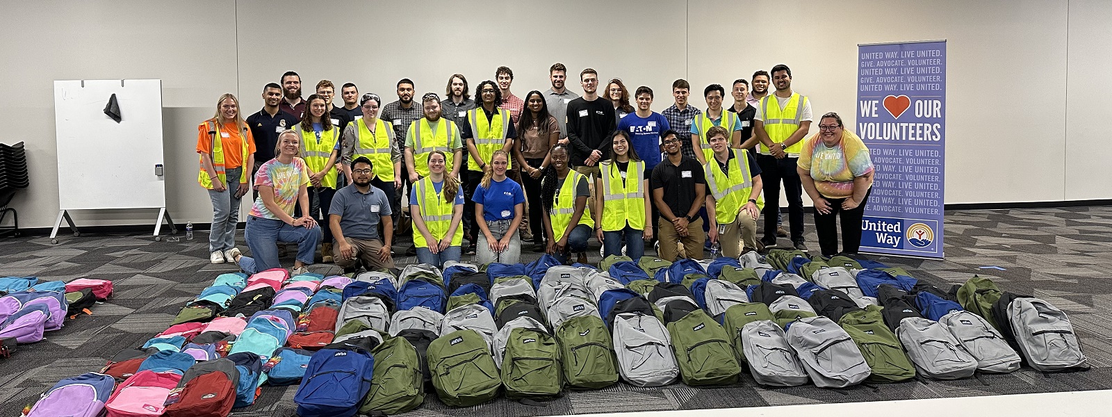 Eaton Volunteers with Backpacks
