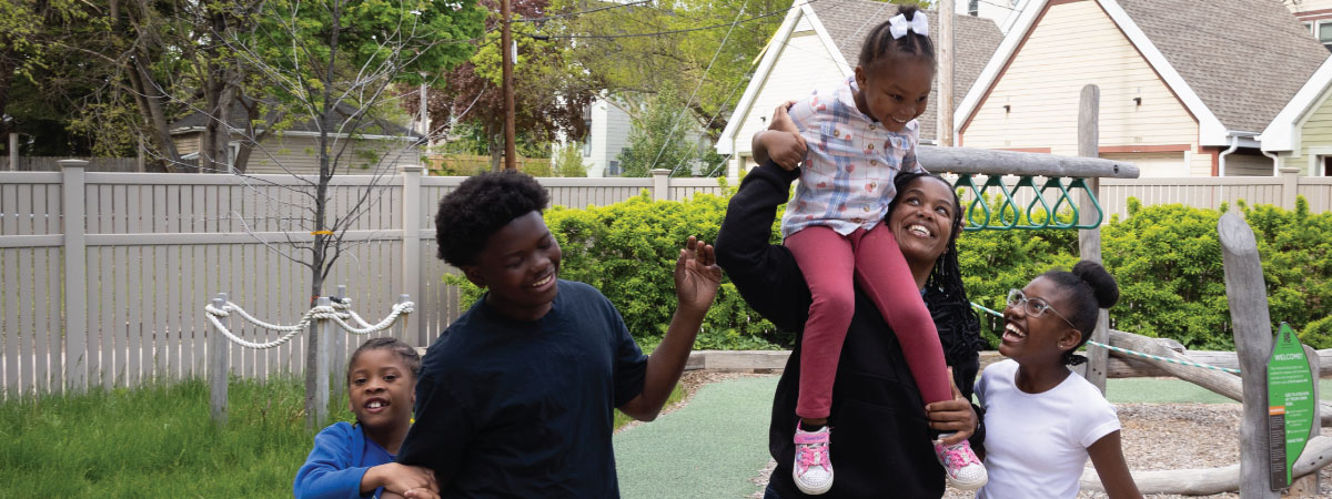 Phillis and her family at Rooted & Rising