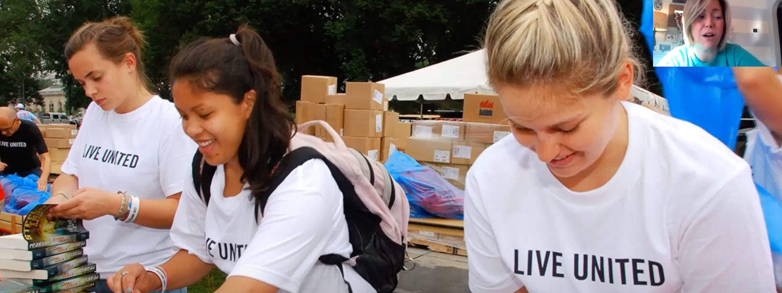 Image of people sorting books