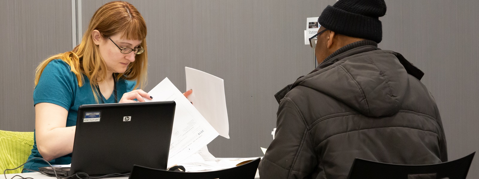 VITA volunteers help community members file their taxes
