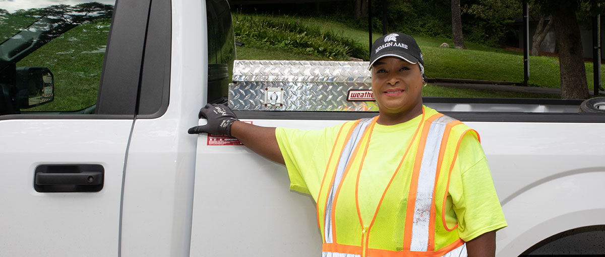 Image of Women by Truck