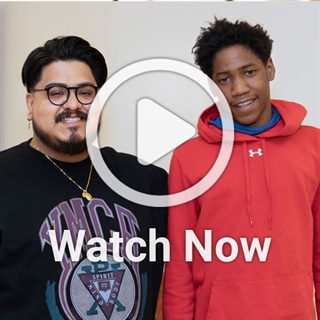 image of man and boy with a play overlay button