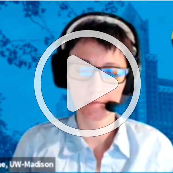 Screenshot of a video with a play button to signify it's a video