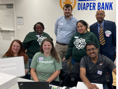 Kris Szatmary and others volunteering at a Techquity Device Distribution event